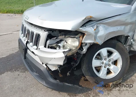 2014 Jeep Compass Sport z USA, uszkodzony, nr VIN 1C4NJCBAXED523634